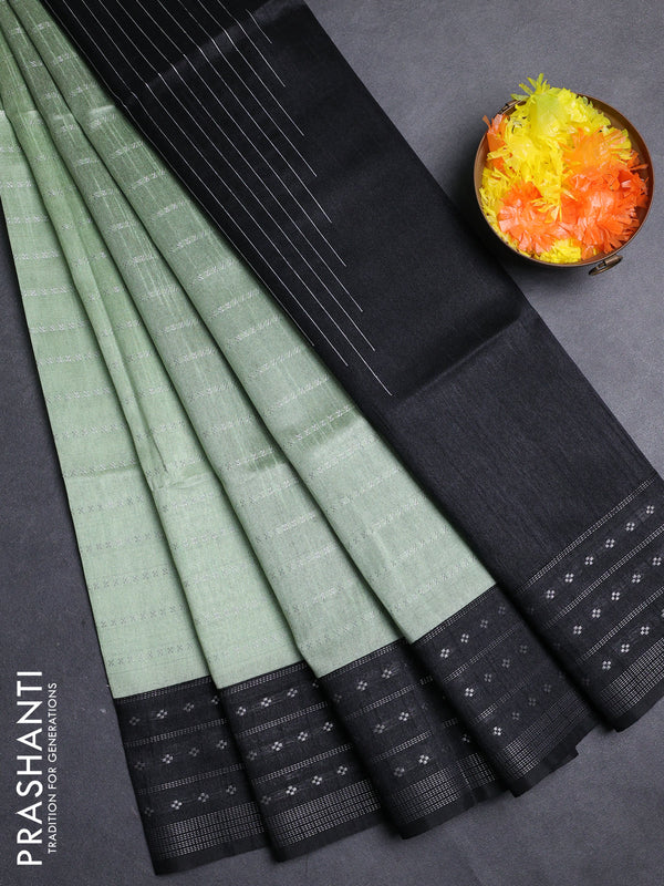 Semi dupion saree pastel green and black with allover silver zari weaves and silver zari woven border