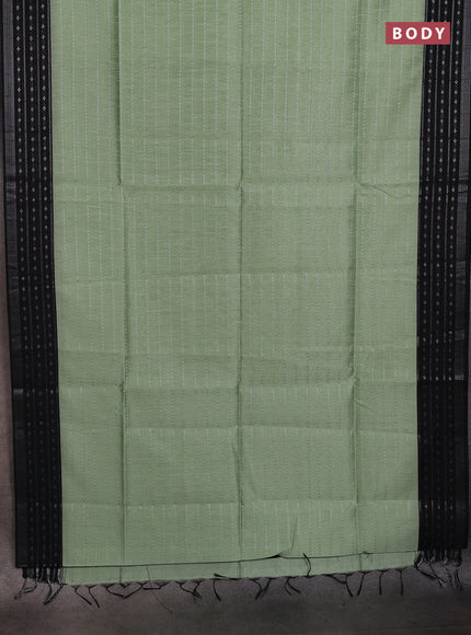 Semi dupion saree pastel green and black with allover silver zari weaves and silver zari woven border