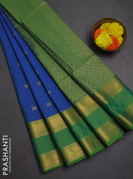 Semi soft silk saree peacock blue and light gree with allover zari weaves & buttas and rettapet zari woven border