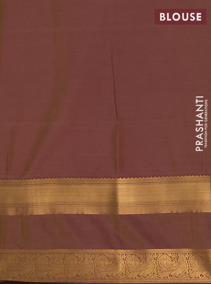 Semi soft silk saree pale yellow and purple with allover zari weaves & buttas and rettapet zari woven border