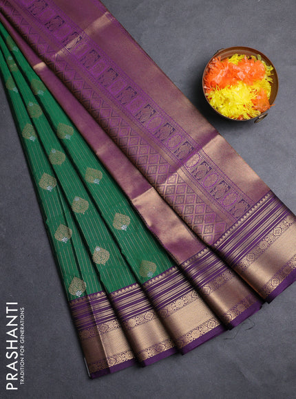 Semi soft silk saree green and purple with allover zari weaves & buttas and zari woven border