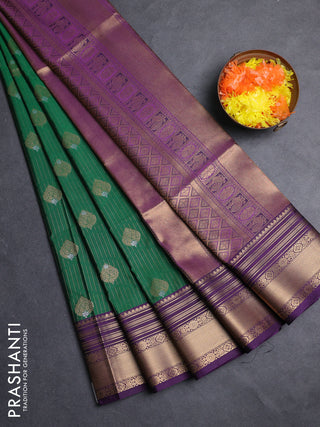 Semi soft silk saree green and purple with allover zari weaves & buttas and zari woven border