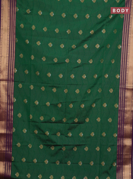 Semi soft silk saree green and purple with allover zari weaves & buttas and zari woven border
