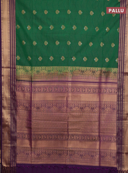 Semi soft silk saree green and purple with allover zari weaves & buttas and zari woven border