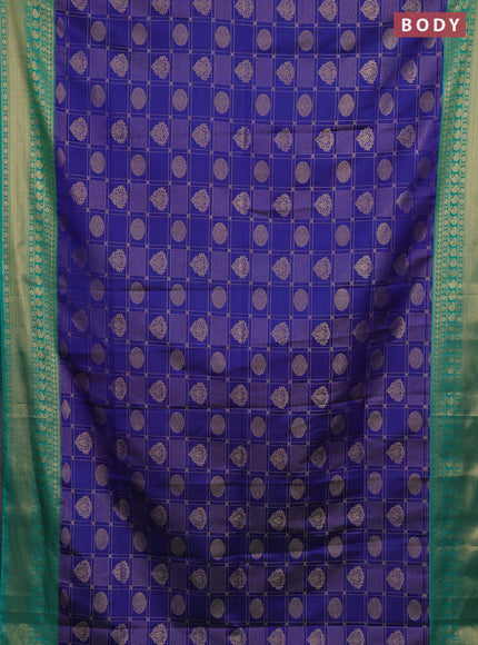 Semi soft silk saree blue and teal green with allover zari checks & buttas and zari woven border