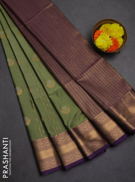 Semi soft silk saree elaichi green and purple with allover zari weaves & buttas and zari woven border