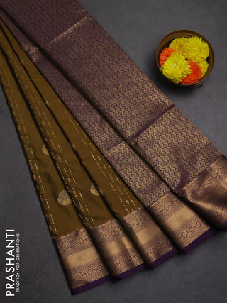 Semi soft silk saree mehendi green and purple with allover zari weaves & buttas and zari woven border
