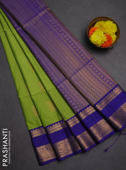 Semi soft silk saree light green and blue with allover zari woven buttas and rettapet zari woven border