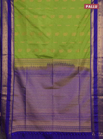 Semi soft silk saree light green and blue with allover zari woven buttas and rettapet zari woven border