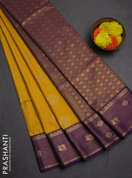 Semi soft silk saree yellow and purple with zari woven buttas and zari woven border