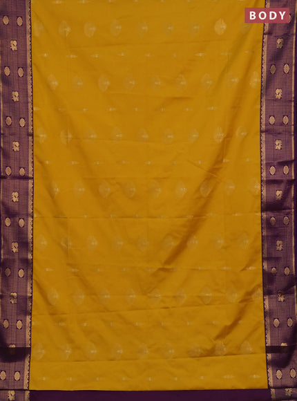 Semi soft silk saree yellow and purple with zari woven buttas and zari woven border