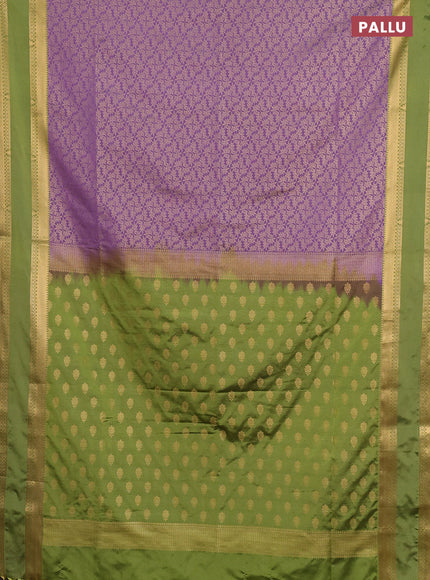 Semi soft silk saree lavender and mehendi green with allover zari woven brocade weaves and rettapet zari woven border