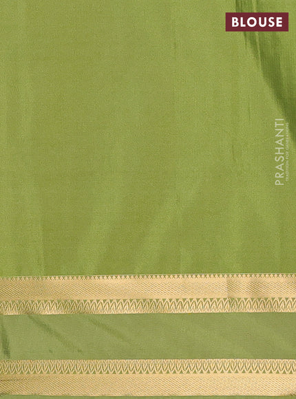 Semi soft silk saree lavender and mehendi green with allover zari woven brocade weaves and rettapet zari woven border