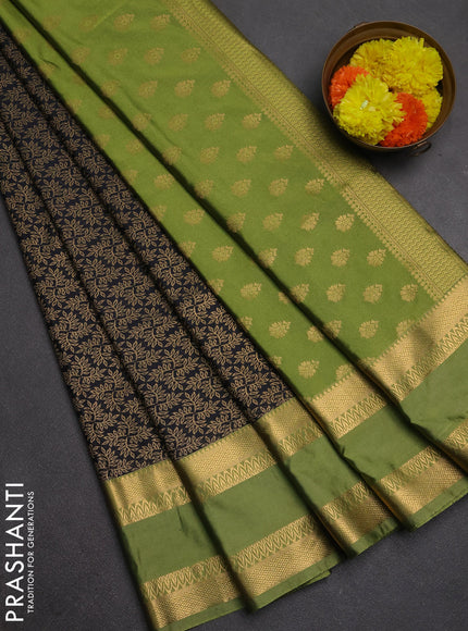 Semi soft silk saree black and green with allover zari woven brocade weaves and rettapet zari woven border