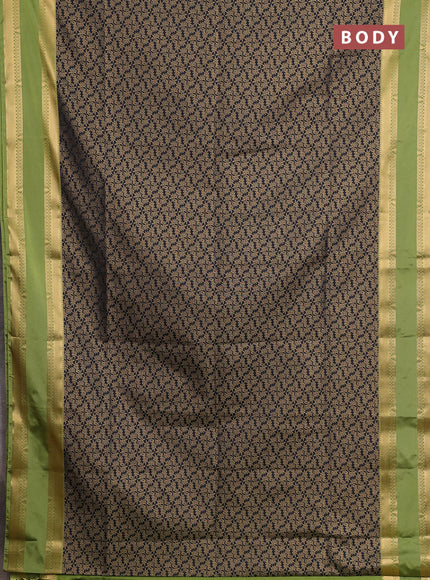 Semi soft silk saree black and green with allover zari woven brocade weaves and rettapet zari woven border