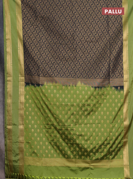 Semi soft silk saree black and green with allover zari woven brocade weaves and rettapet zari woven border