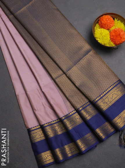Semi soft silk saree pastel pink and navy blue with allover zari woven buttas and rettapet zari woven border