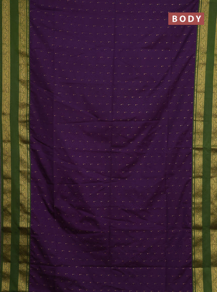 Semi soft silk saree purple and sap green with allover zari woven buttas and rettapet zari woven border