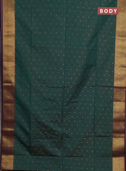 Semi soft silk saree bottle green and purple with allover zari weaves & buttas and zari woven border