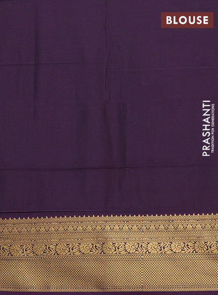 Semi soft silk saree bottle green and purple with allover zari weaves & buttas and zari woven border