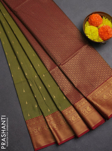 Semi soft silk saree mehendi green and maroon with allover zari weaves & buttas and zari woven border