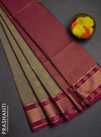 Semi soft silk saree chikku shade and magenta pink with allover zari woven buttas and zari woven border