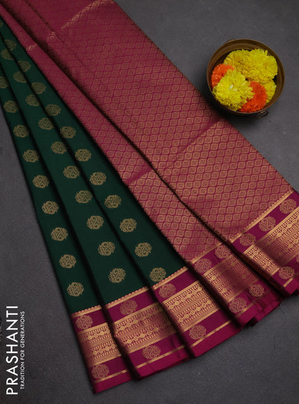 Semi soft silk saree green and magenta pink with allover zari woven buttas and zari woven border