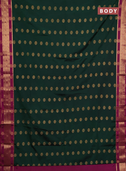 Semi soft silk saree green and magenta pink with allover zari woven buttas and zari woven border