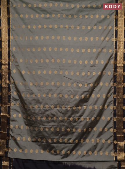 Semi soft silk saree grey  and coffee brown with allover zari woven buttas and zari woven border