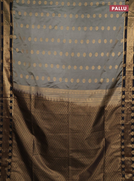 Semi soft silk saree grey  and coffee brown with allover zari woven buttas and zari woven border