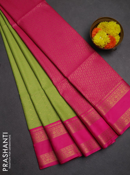 Semi soft silk saree light green and pink with allover zari woven brocade weaves and rettapet zari woven border