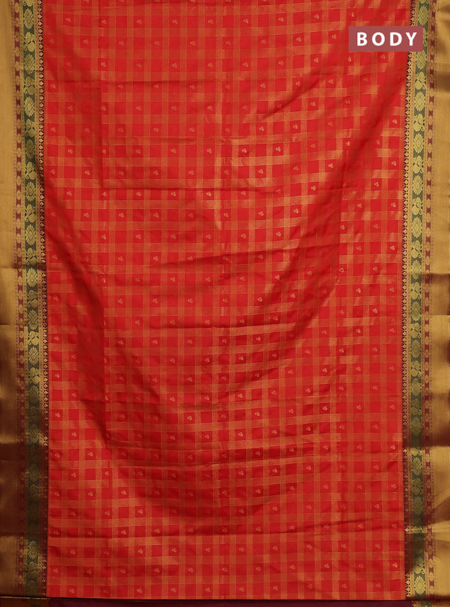 Semi soft silk saree orange and maroon with allover zari checks & buttas and rich zari woven border