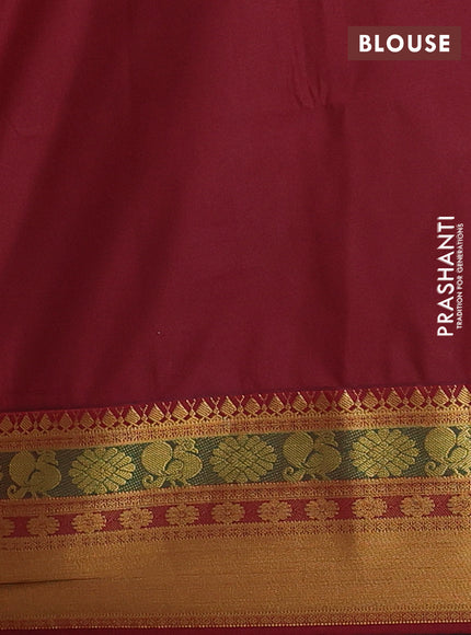 Semi soft silk saree orange and maroon with allover zari checks & buttas and rich zari woven border