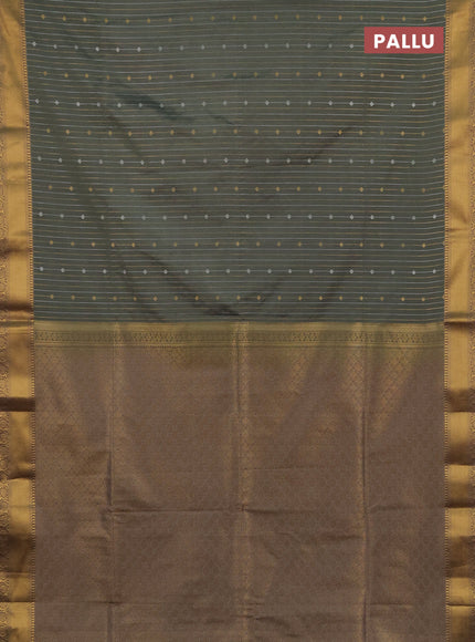 Semi soft silk saree greyish green and grey with allover silver & gold zari weaves and zari woven border