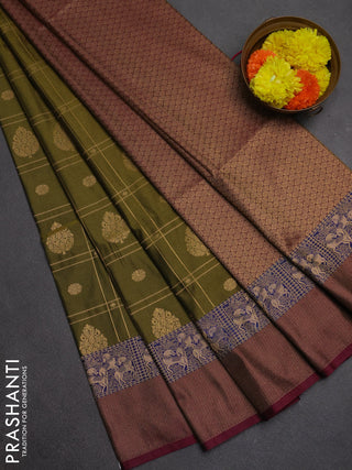 Semi soft silk saree mehendi green and magenta pink blue with allover zari checks & buttas and zari woven border