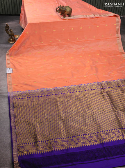 Pure narayanpet silk saree pale orange and violet with allover zari woven buttas and small zari woven border