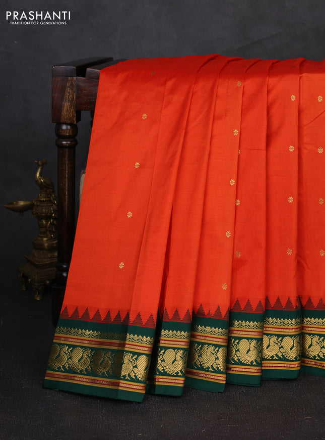 Pure narayanpet silk saree orange and green with allover zari woven buttas and temple design zari woven border