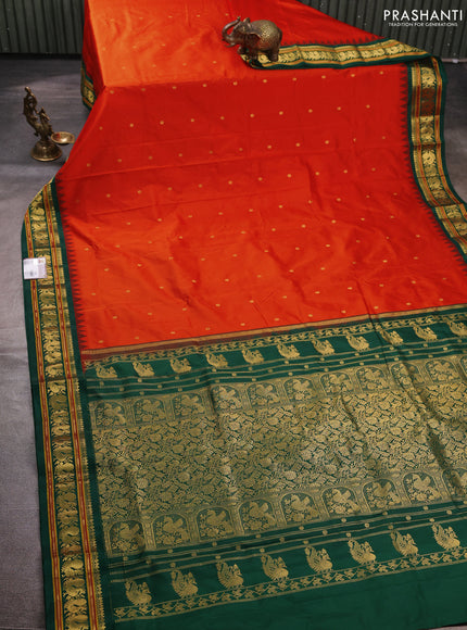 Pure narayanpet silk saree orange and green with allover zari woven buttas and temple design zari woven border