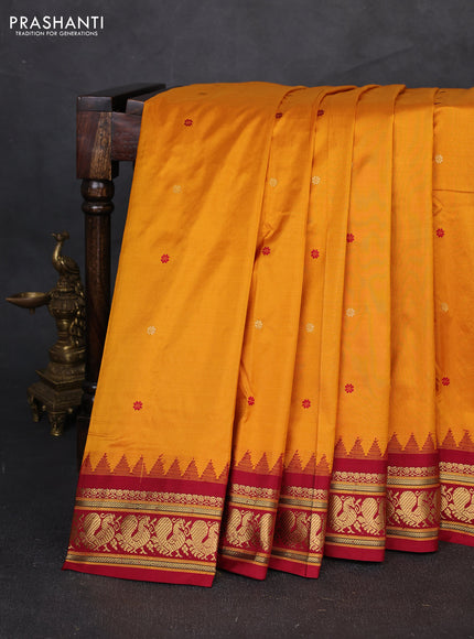 Pure narayanpet silk saree dark mustard and maroon with allover zari woven buttas and temple design zari woven border