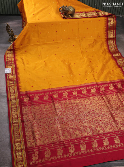 Pure narayanpet silk saree dark mustard and maroon with allover zari woven buttas and temple design zari woven border
