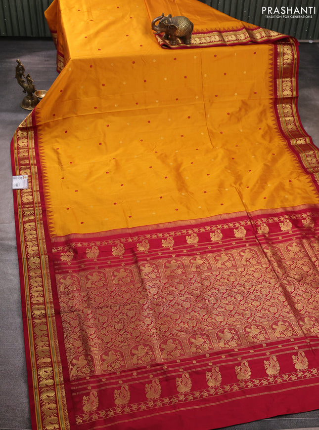Pure narayanpet silk saree dark mustard and maroon with allover zari woven buttas and temple design zari woven border