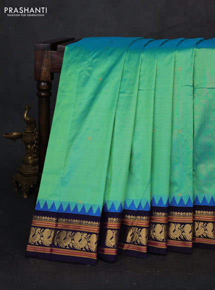 Pure narayanpet silk saree teal green and navy blue with allover zari woven buttas and temple design zari woven border