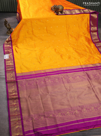 Pure narayanpet silk saree mango yellow and magenta pink with allover zari woven buttas and zari woven korvai border