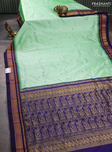 Pure narayanpet silk saree light green and violet with allover thread & zari woven buttas and temple design zari woven border