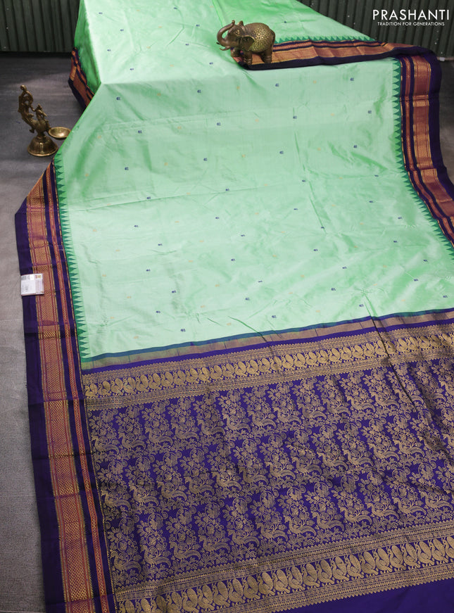 Pure narayanpet silk saree light green and violet with allover thread & zari woven buttas and temple design zari woven border