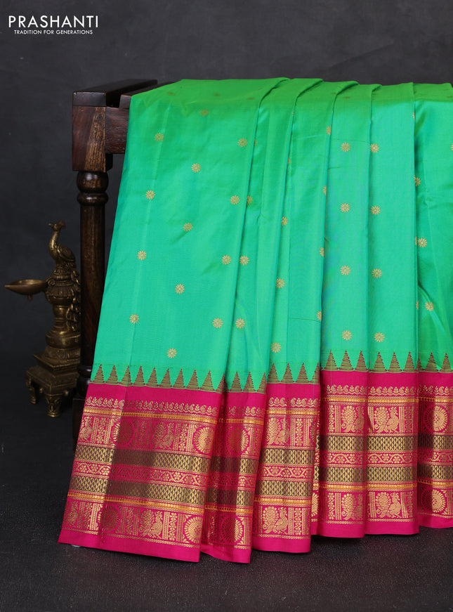Pure narayanpet silk saree light green and pink with allover zari woven buttas and temple design long zari woven border