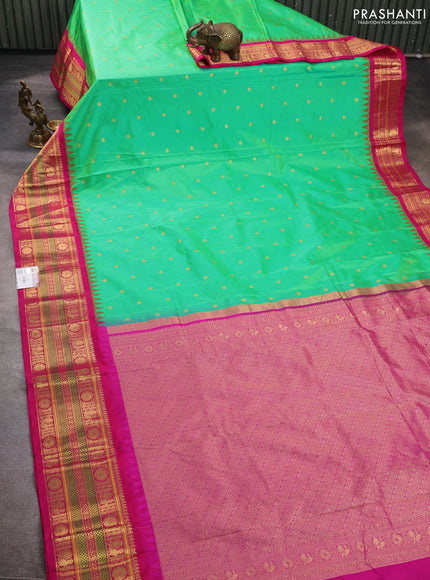 Pure narayanpet silk saree light green and pink with allover zari woven buttas and temple design long zari woven border