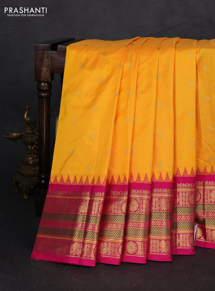 Pure narayanpet silk saree mango yellow and pink with allover zari woven buttas and temple design long zari woven border