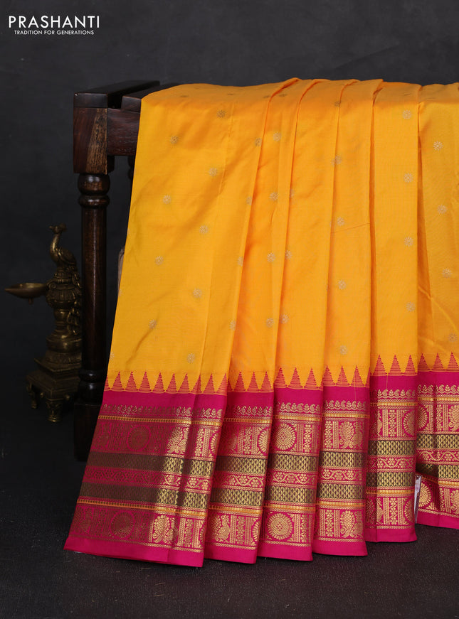 Pure narayanpet silk saree mango yellow and pink with allover zari woven buttas and temple design long zari woven border