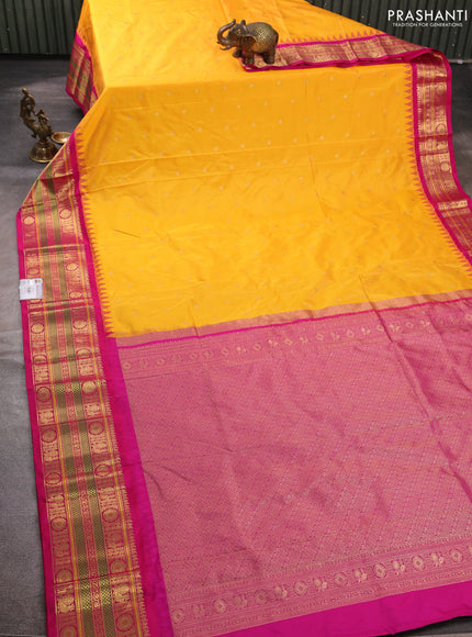Pure narayanpet silk saree mango yellow and pink with allover zari woven buttas and temple design long zari woven border